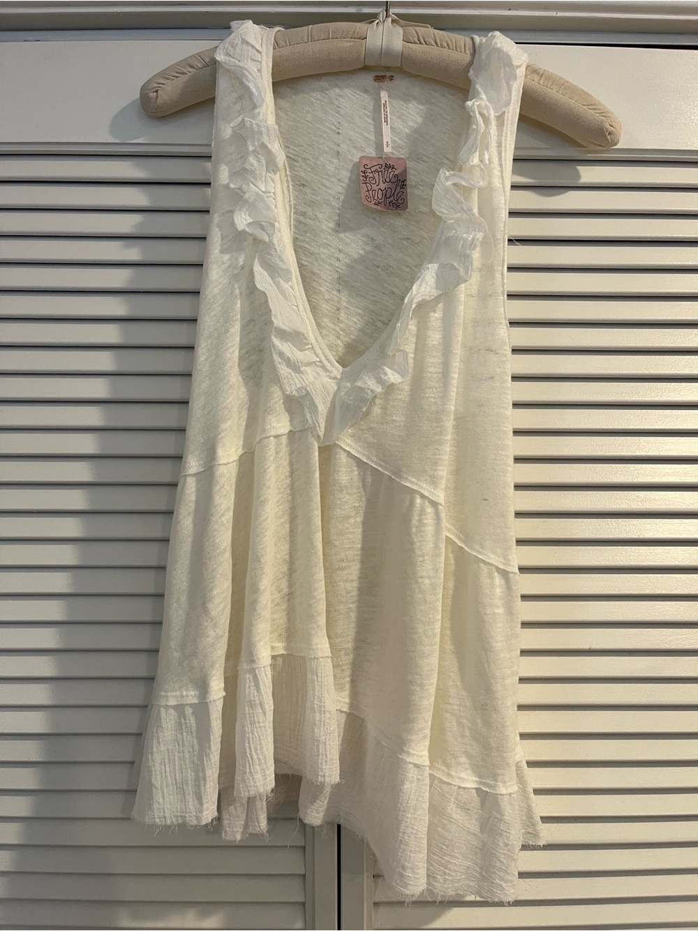 Free people sleeveless top NWT cream  Linen cotton swing ruffle v neck
